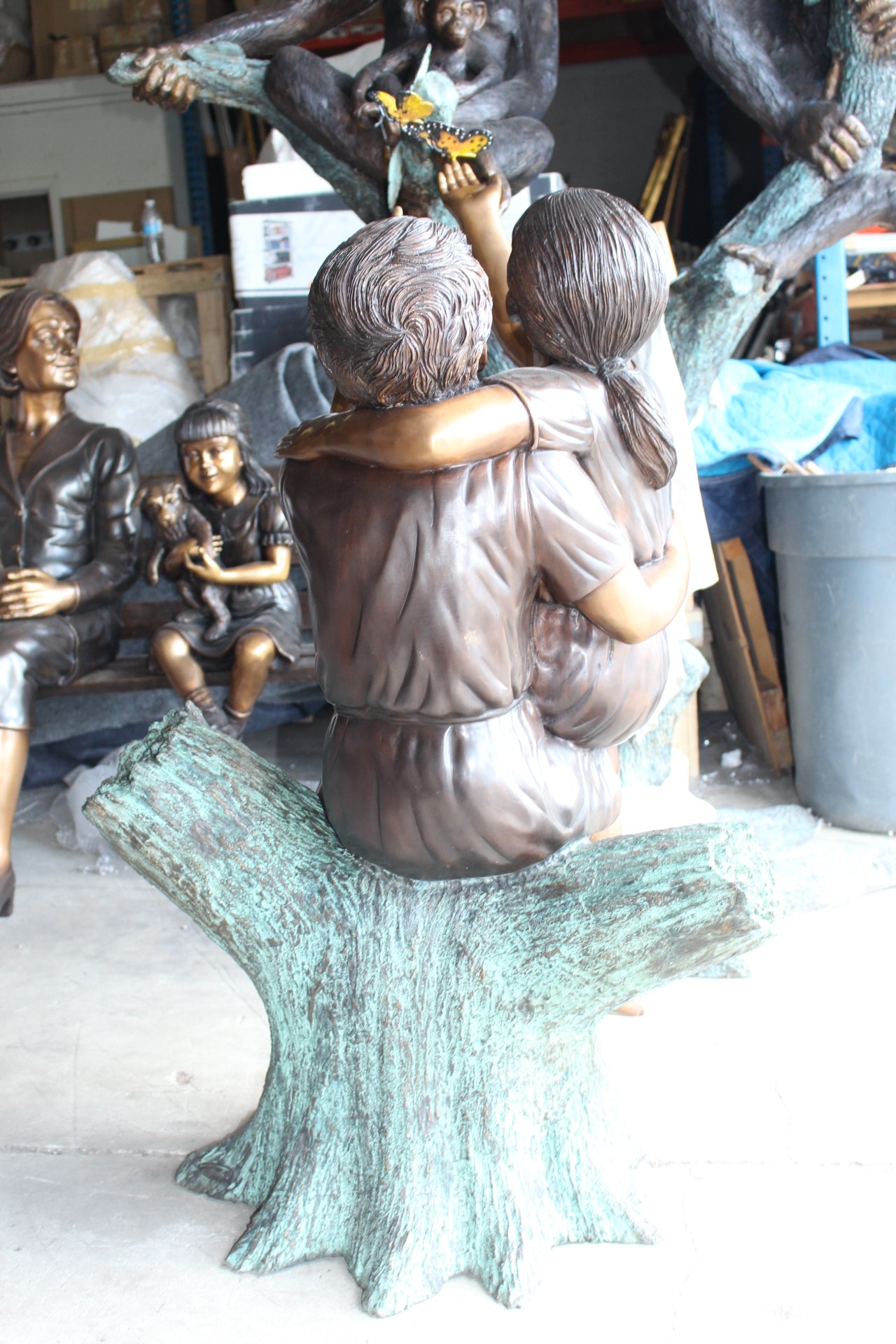 Two Kids Playing with Butterflies Bronze Statue - Size: 30"L x 30"W x 50"H.