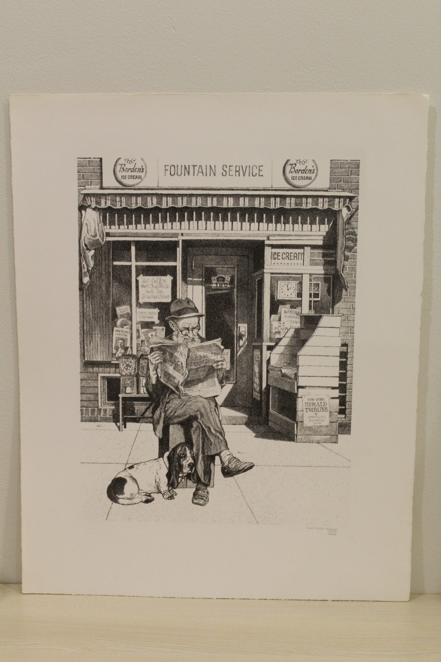NIFAO Emanuel Schary “Candy Store” Lithograph – Black & White Nostalgic Fine Art Print, Vintage Street Scene with Newspaper Reader, Collectible Wall Drcor 12 x 16