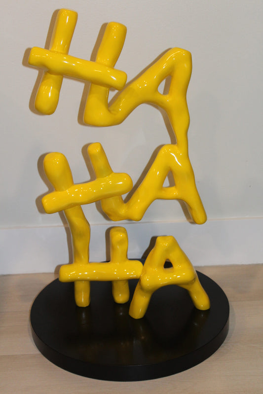 Yellow Pastel HA HA HA Resin Statue on Black Metal Base 20" x 20" x 31"H