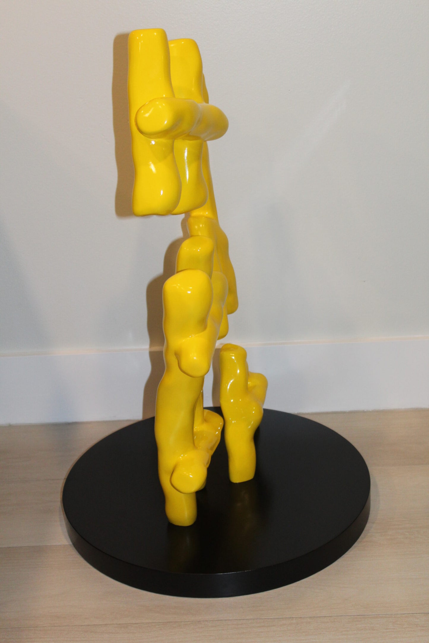 Yellow Pastel HA HA HA Resin Statue on Black Metal Base 20" x 20" x 31"H