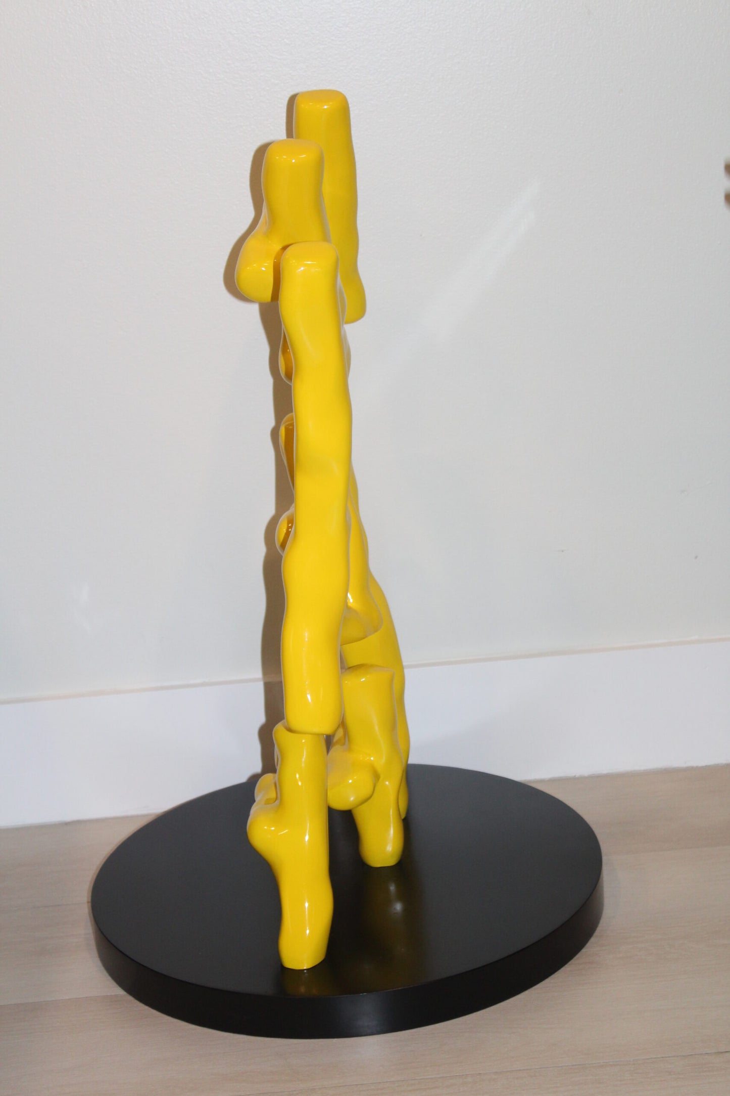Yellow Pastel HA HA HA Resin Statue on Black Metal Base 20" x 20" x 31"H