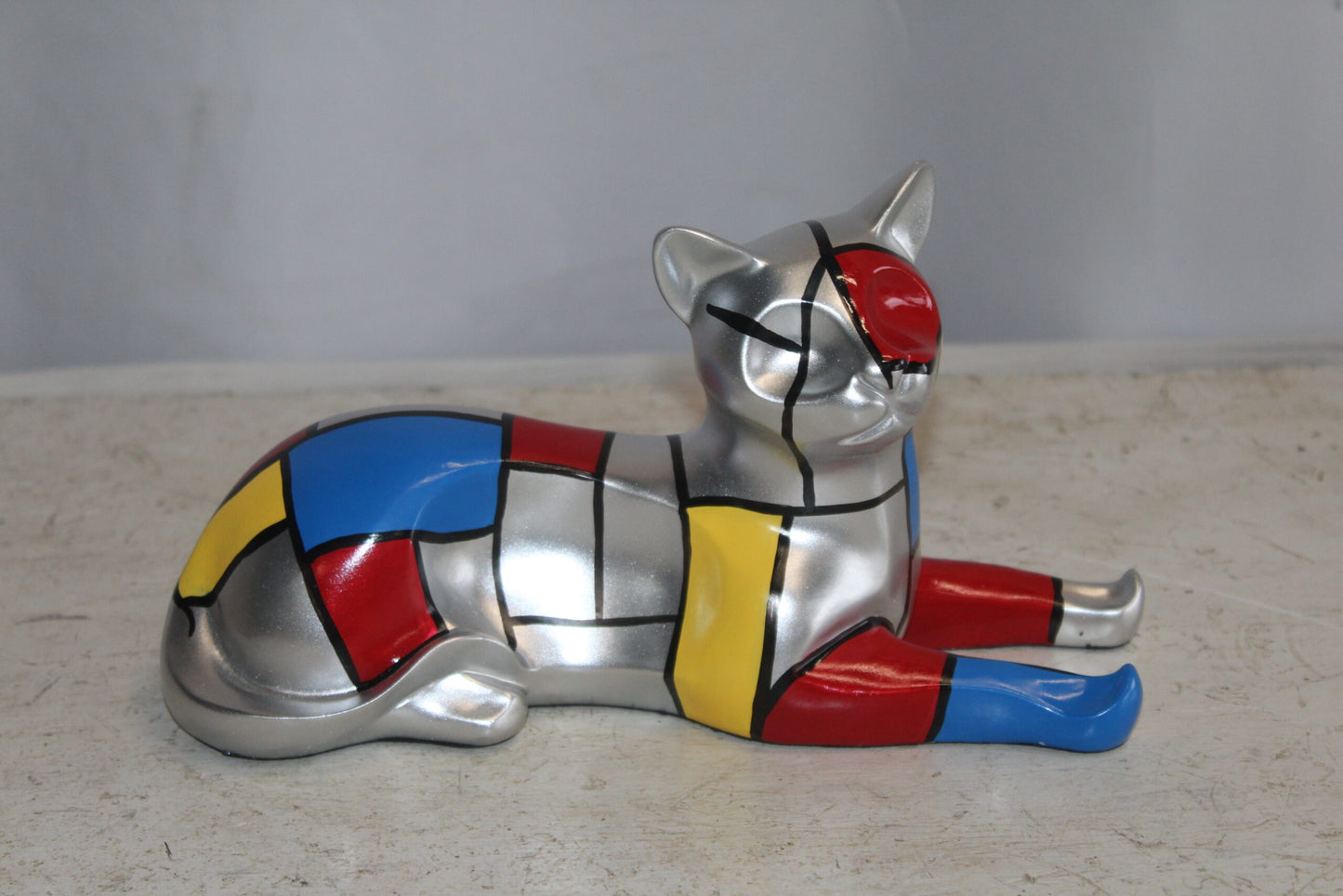Geometric Themed Laying Cat Colorful Resin Statue 11" x 4" x 6"H