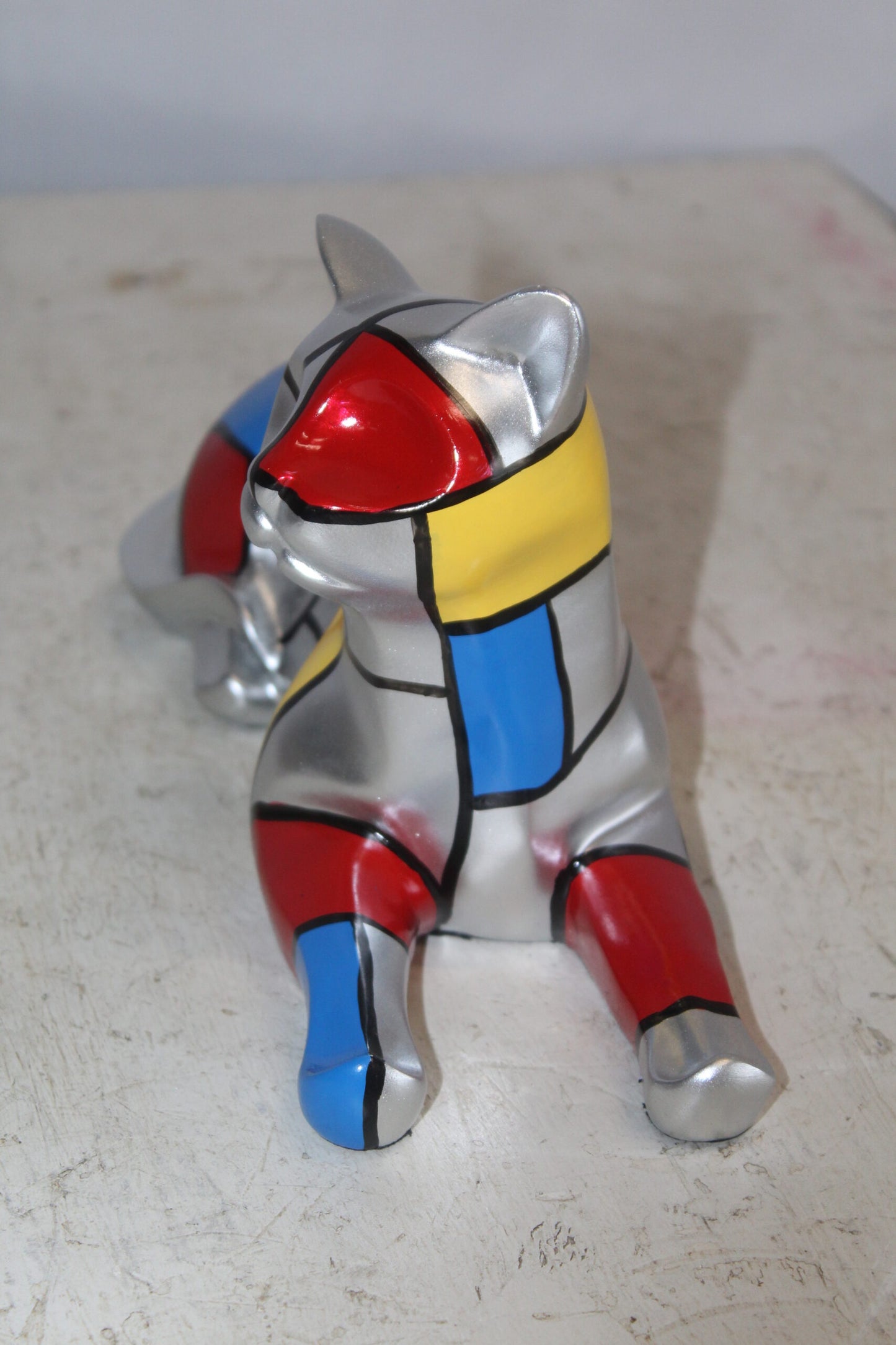Geometric Themed Laying Cat Colorful Resin Statue 11" x 4" x 6"H