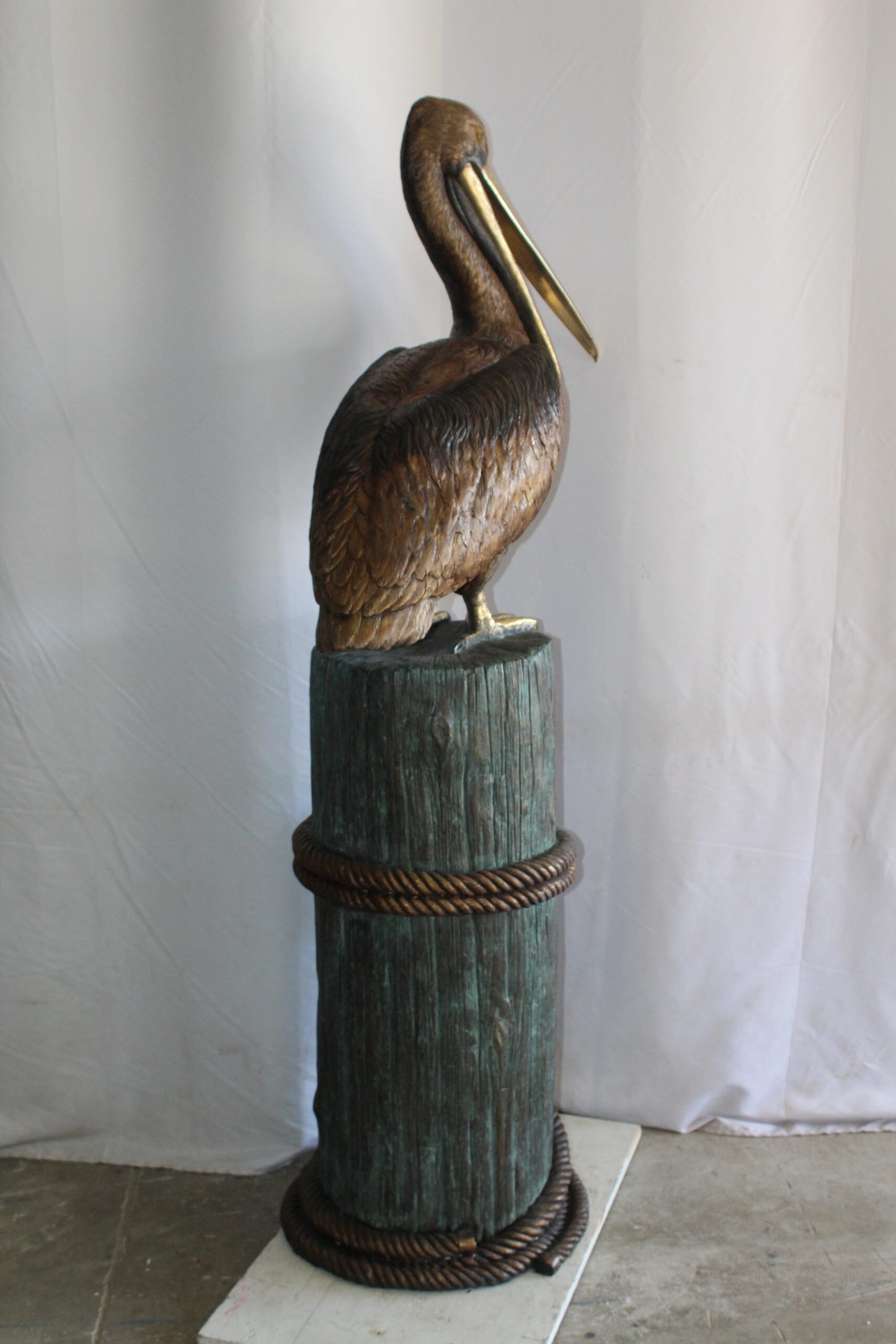 Lifesize Bronze Pelican Fountain Mounted on a Tree Stamp 33" x 23" x 73"H