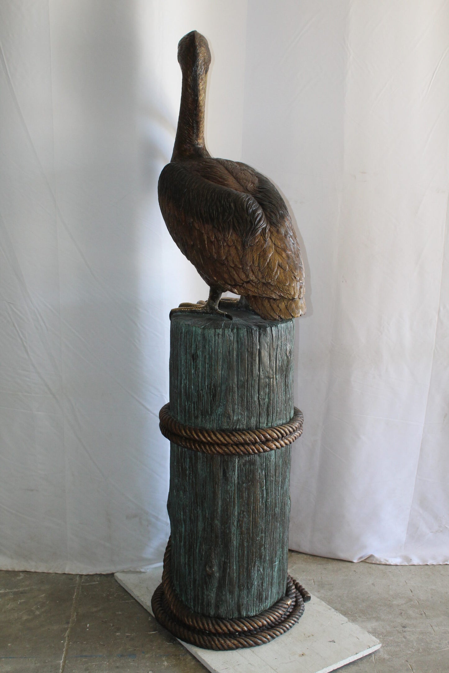 Lifesize Bronze Pelican Fountain Mounted on a Tree Stamp 33" x 23" x 73"H