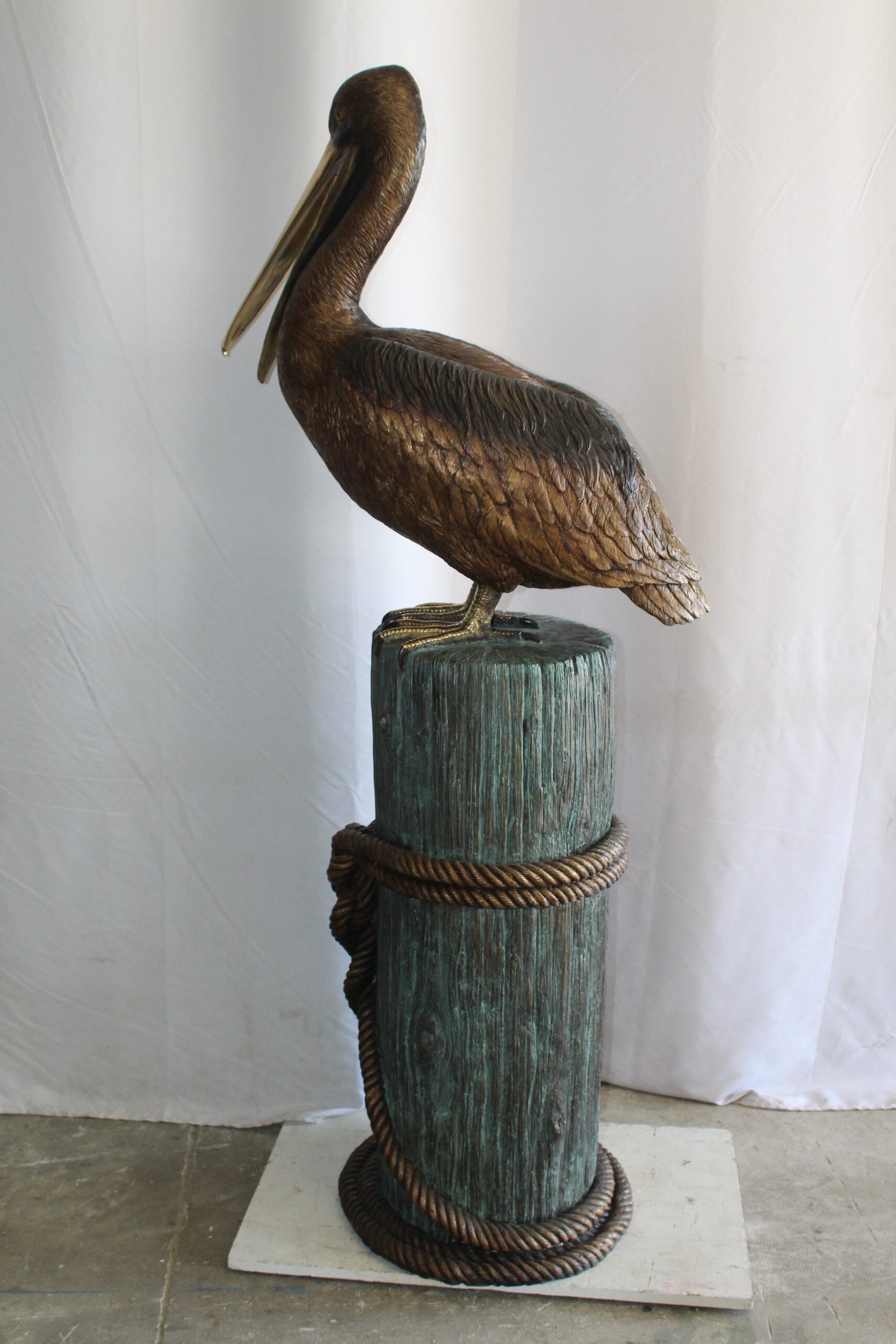 Lifesize Bronze Pelican Fountain Mounted on a Tree Stamp 33" x 23" x 73"H
