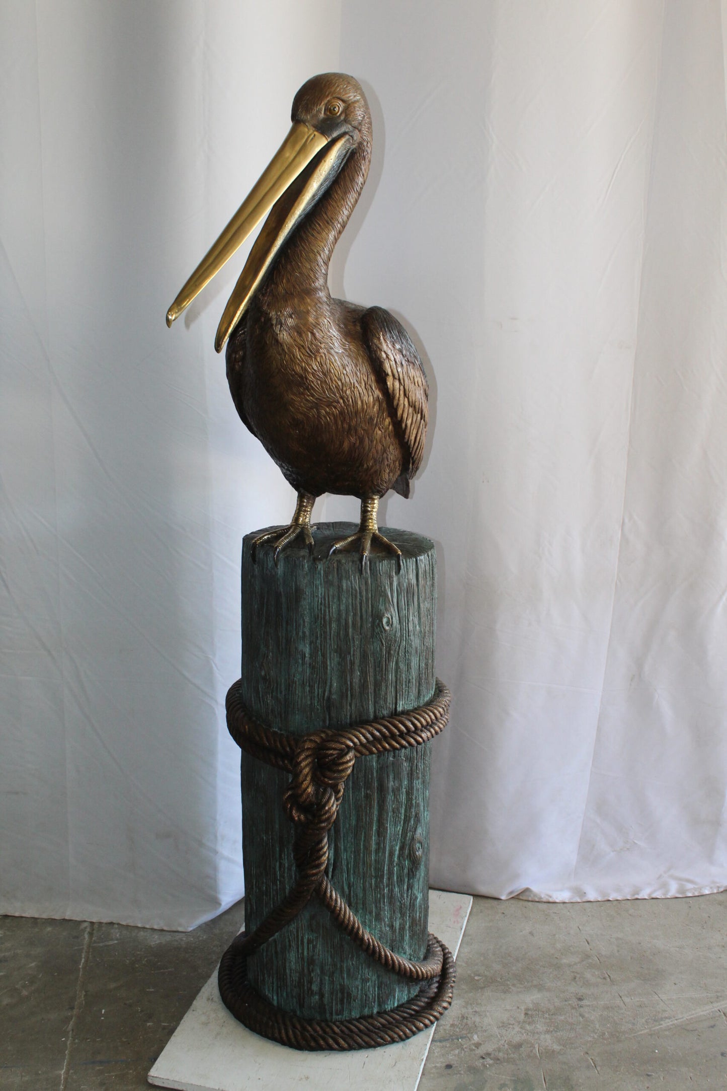 Lifesize Bronze Pelican Fountain Mounted on a Tree Stamp 33" x 23" x 73"H