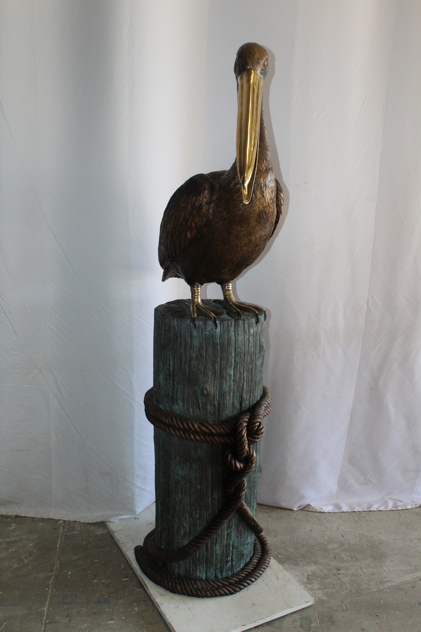 Lifesize Bronze Pelican Fountain Mounted on a Tree Stamp 33" x 23" x 73"H