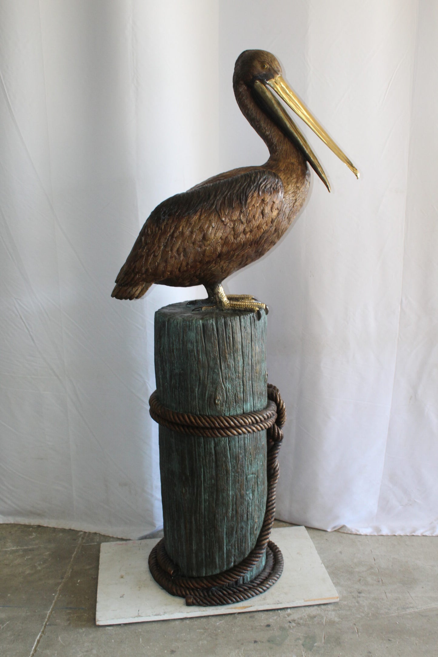 Lifesize Bronze Pelican Fountain Mounted on a Tree Stamp 33" x 23" x 73"H