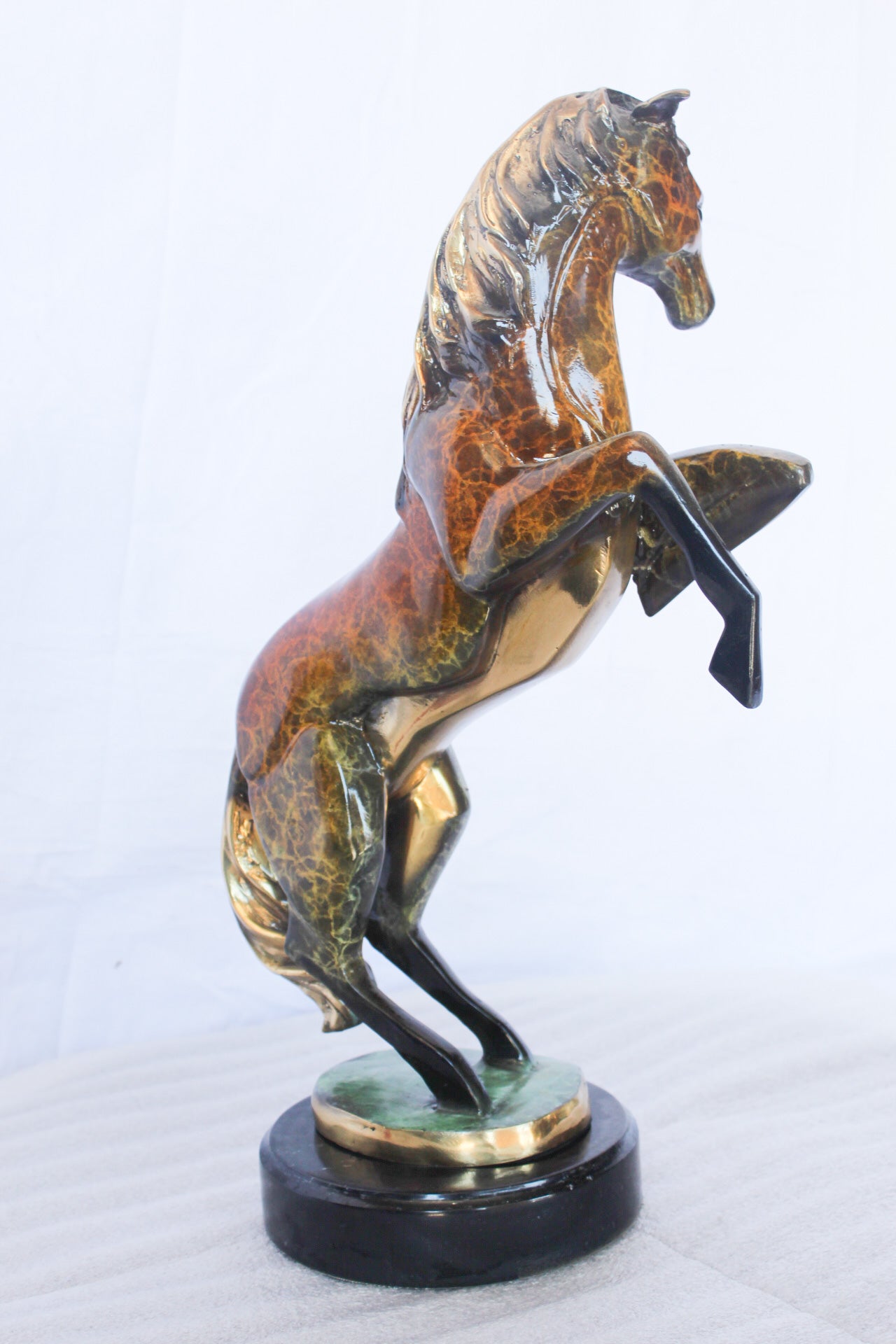 Colored rearing horse bronze statue -  Size: 14"L x 7"W x 21"H.