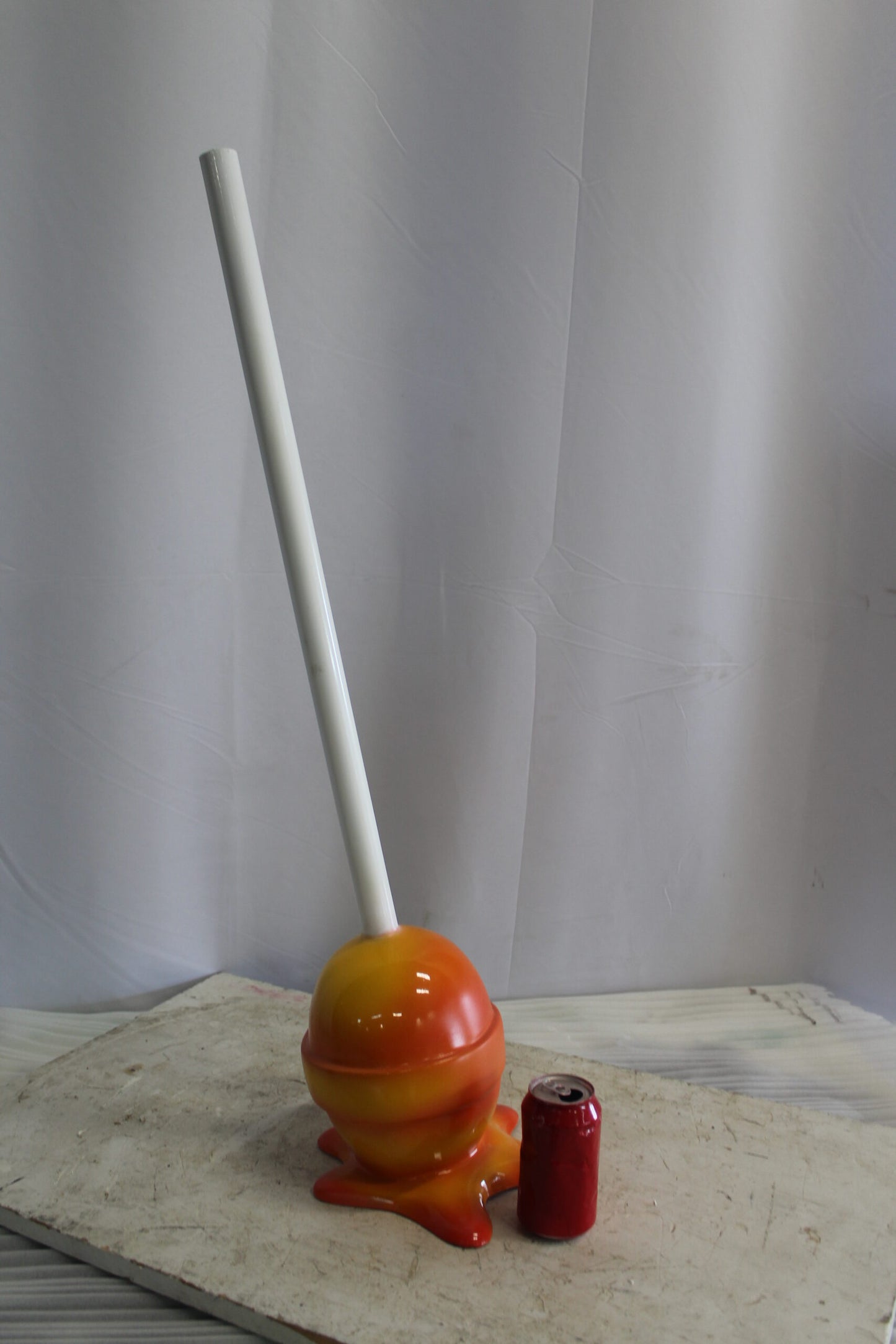 Vibrant Resin Lollipop Statue Orange and Yellow Delight 10" x 10" x 34"H