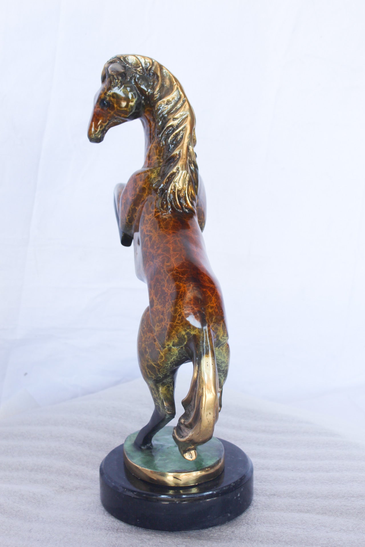 Colored rearing horse bronze statue -  Size: 14"L x 7"W x 21"H.