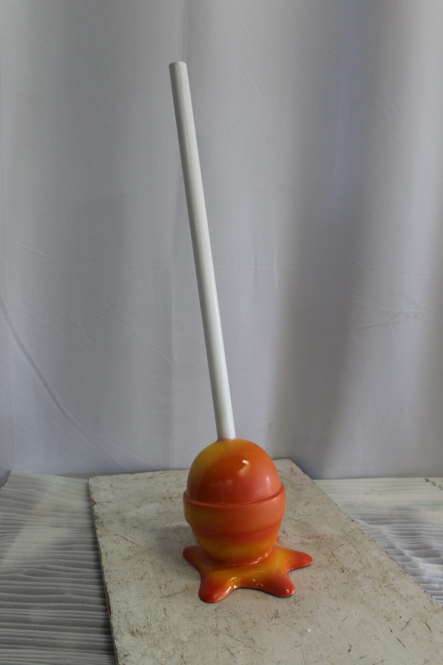 Vibrant Resin Lollipop Statue Orange and Yellow Delight 10" x 10" x 34"H