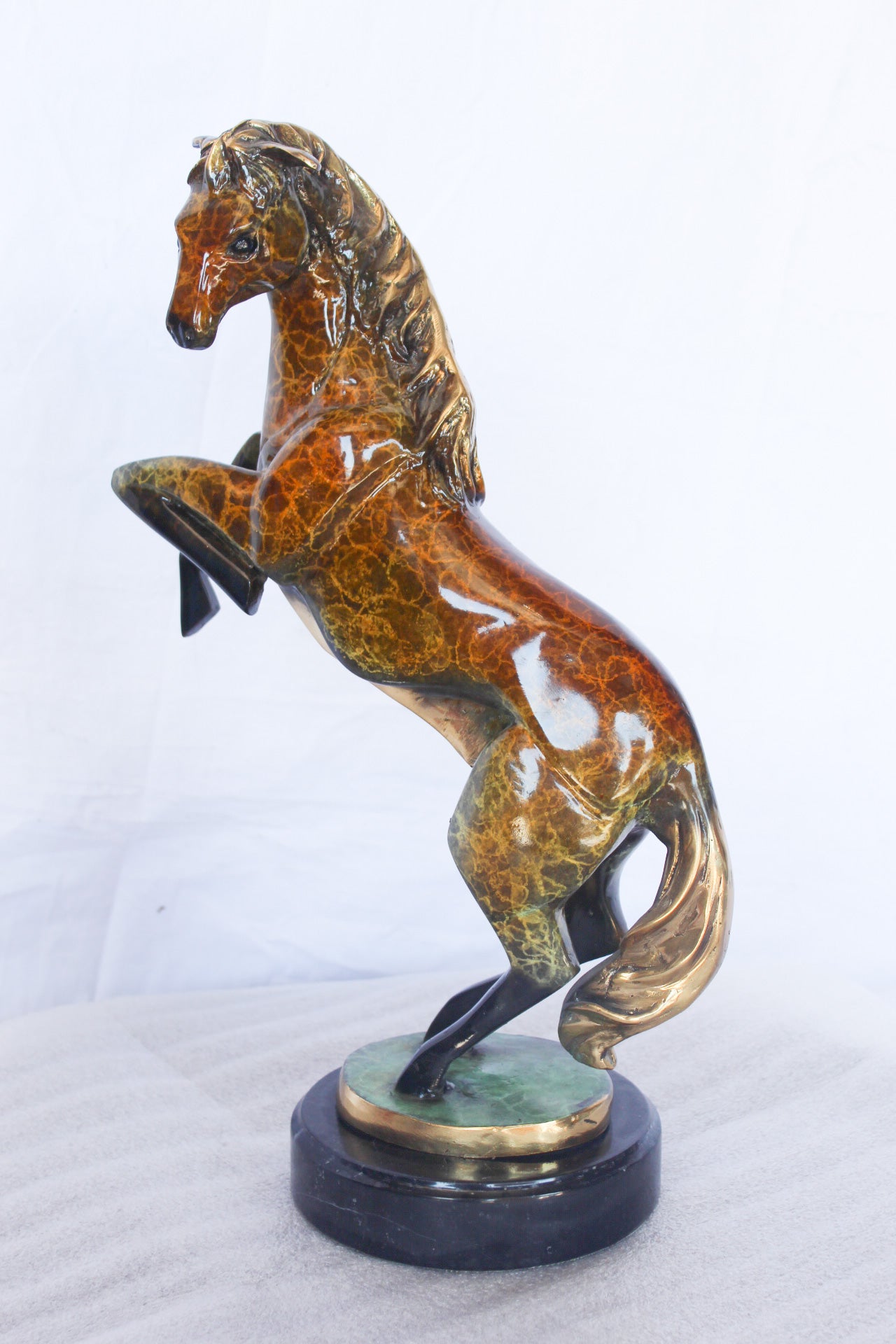Colored rearing horse bronze statue -  Size: 14"L x 7"W x 21"H.