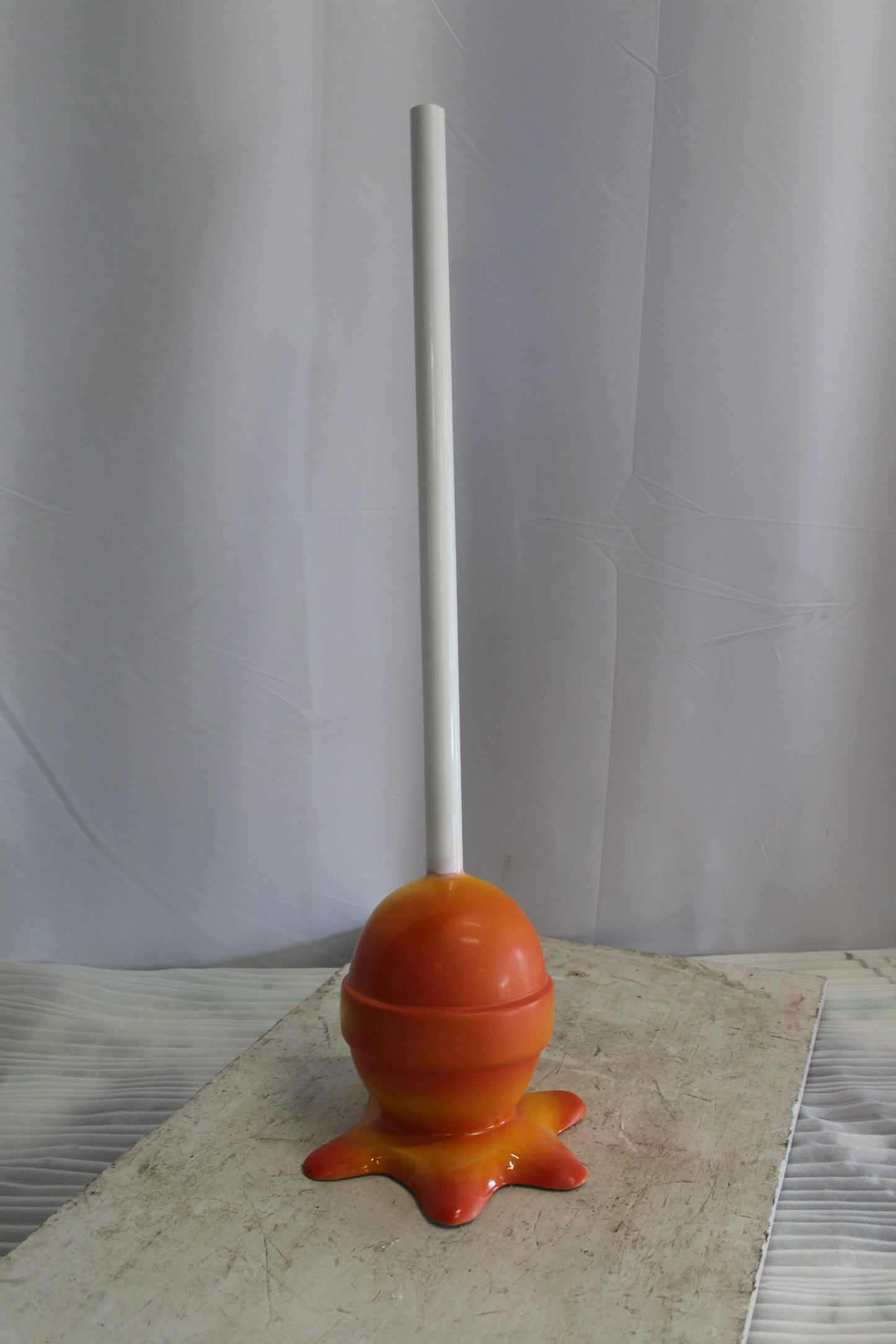 Vibrant Resin Lollipop Statue Orange and Yellow Delight 10" x 10" x 34"H