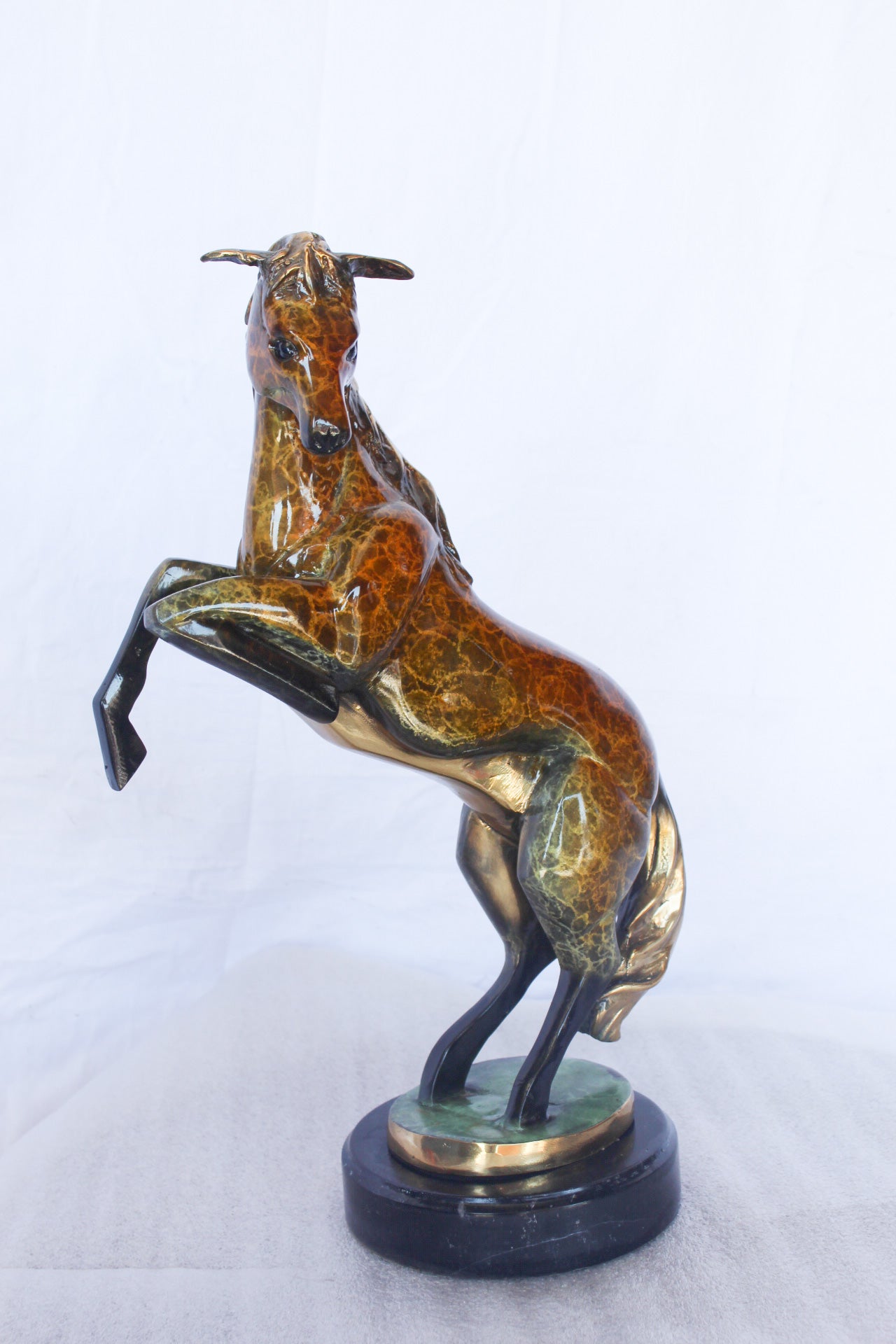 Colored rearing horse bronze statue -  Size: 14"L x 7"W x 21"H.