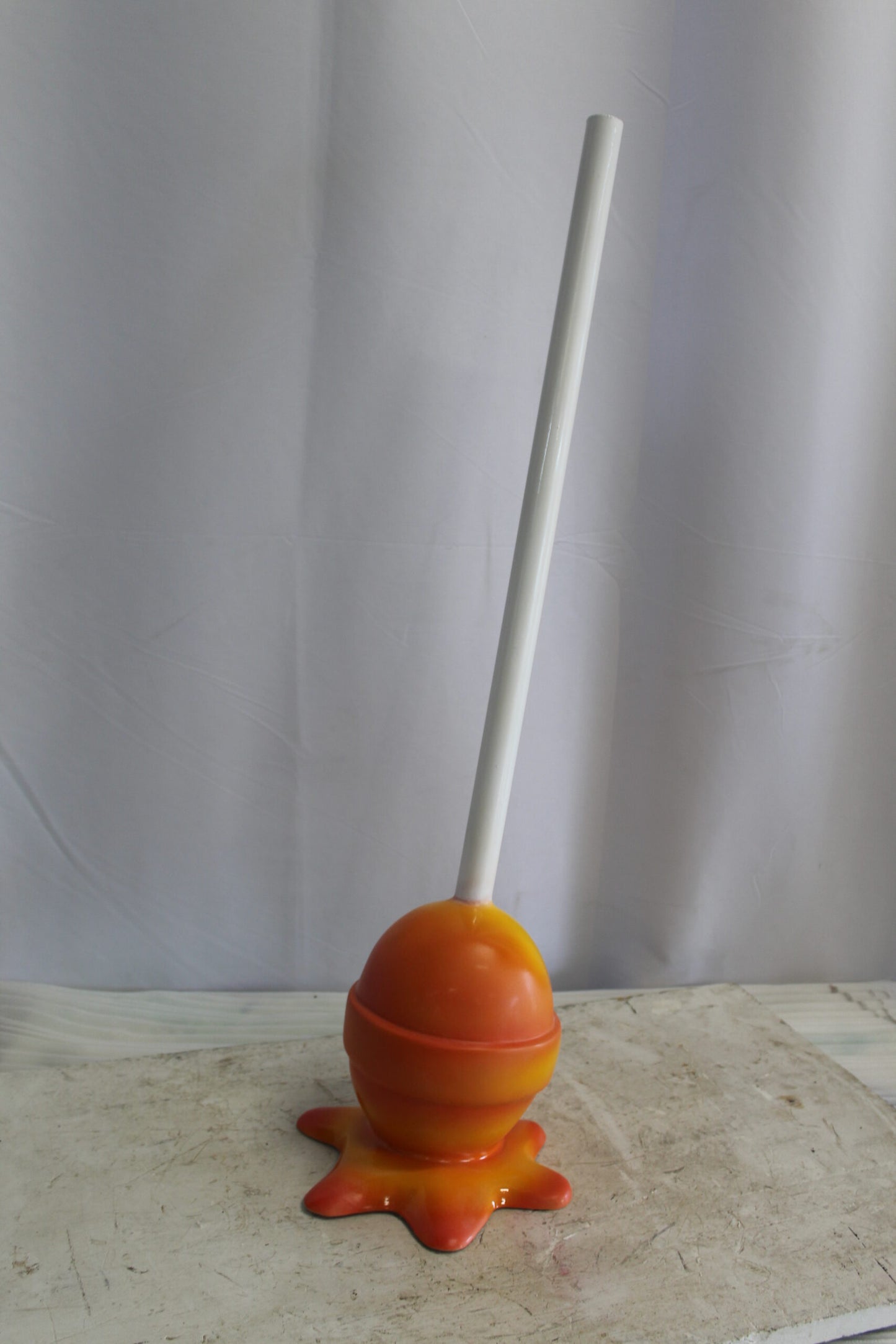 Vibrant Resin Lollipop Statue Orange and Yellow Delight 10" x 10" x 34"H