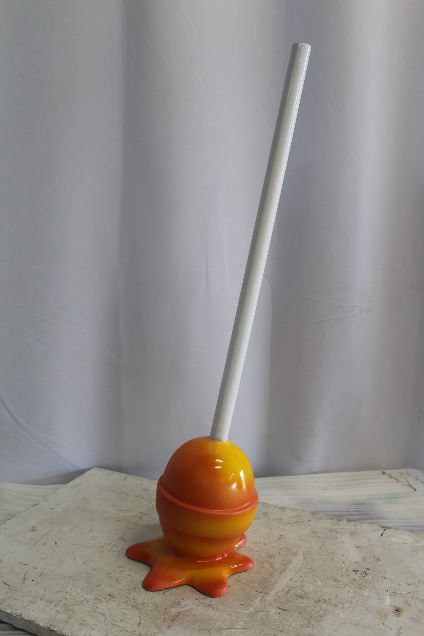 Vibrant Resin Lollipop Statue Orange and Yellow Delight 10" x 10" x 34"H