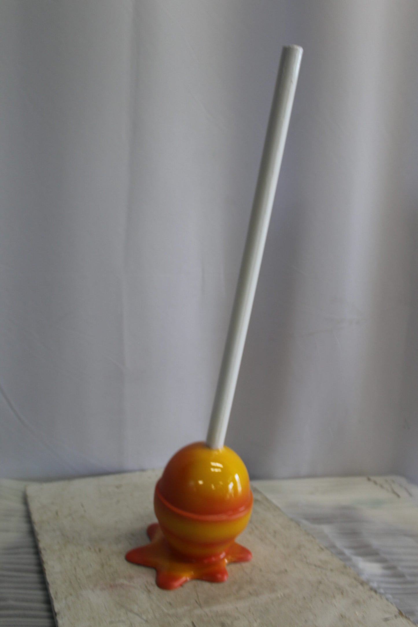 Vibrant Resin Lollipop Statue Orange and Yellow Delight 10" x 10" x 34"H
