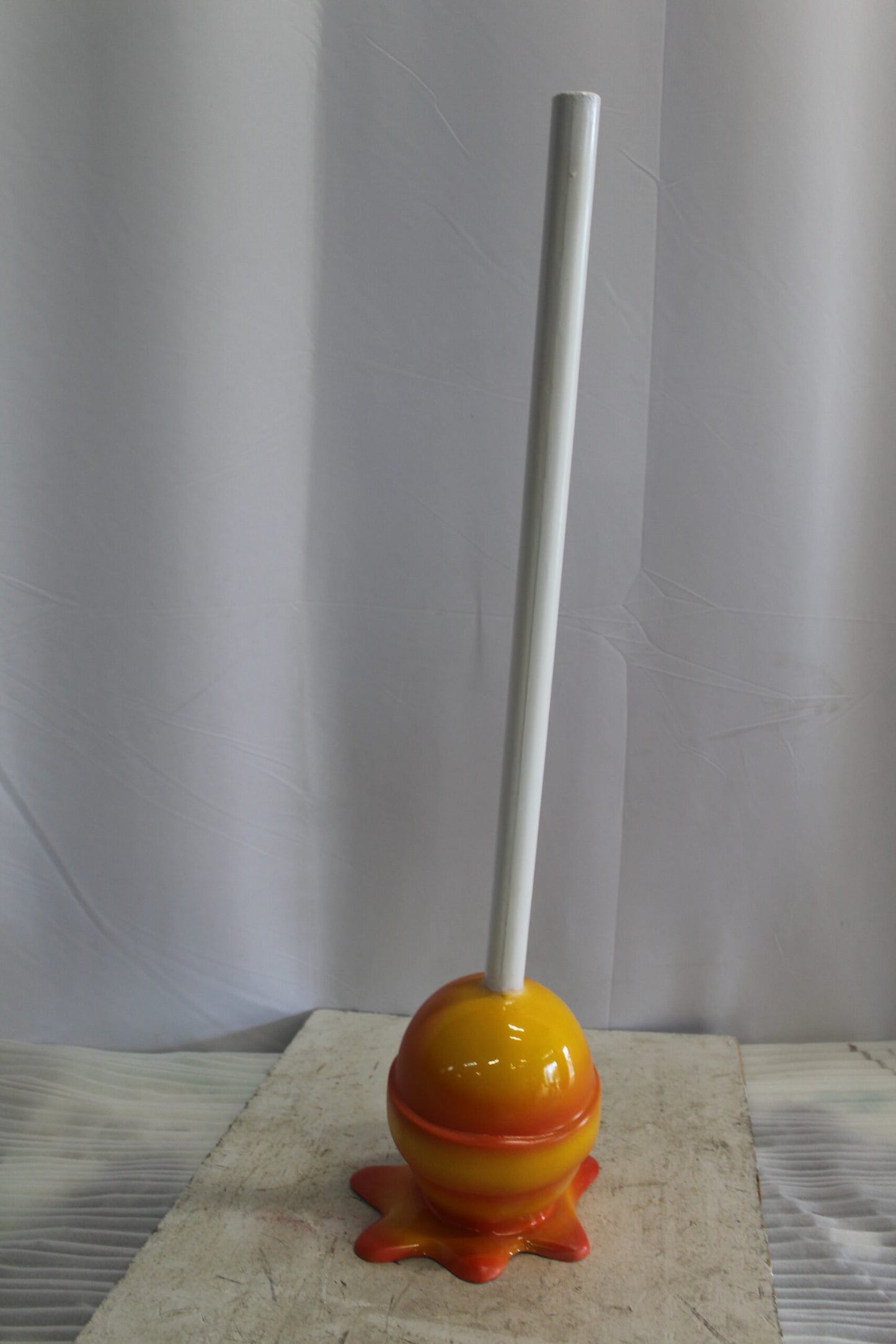 Vibrant Resin Lollipop Statue Orange and Yellow Delight 10" x 10" x 34"H
