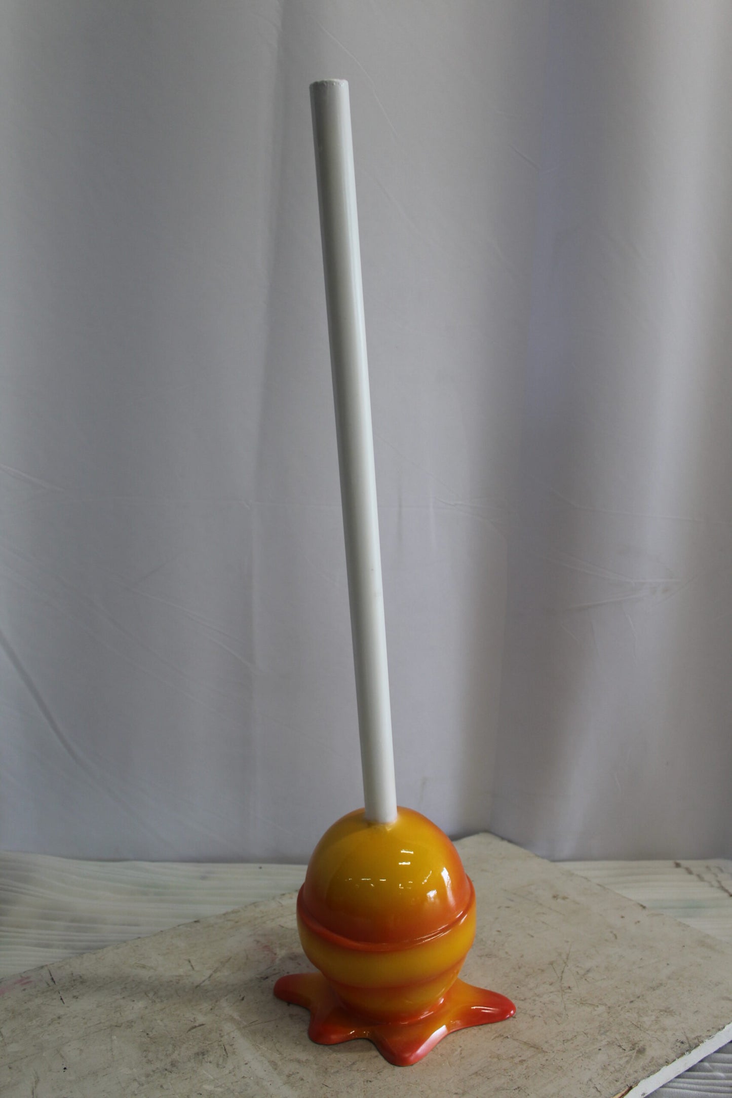 Vibrant Resin Lollipop Statue Orange and Yellow Delight 10" x 10" x 34"H