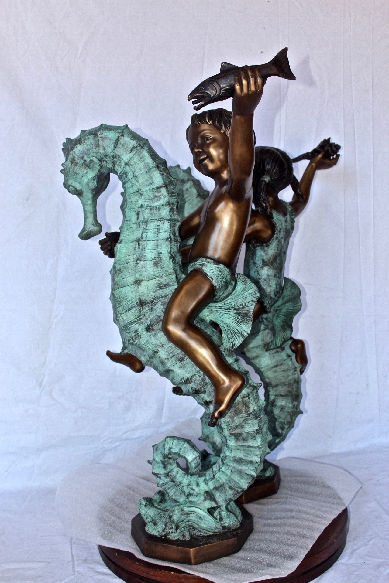 Boy and girl riding seahorses bronze fountain - Size: 18"L x 23"W x 38"H.