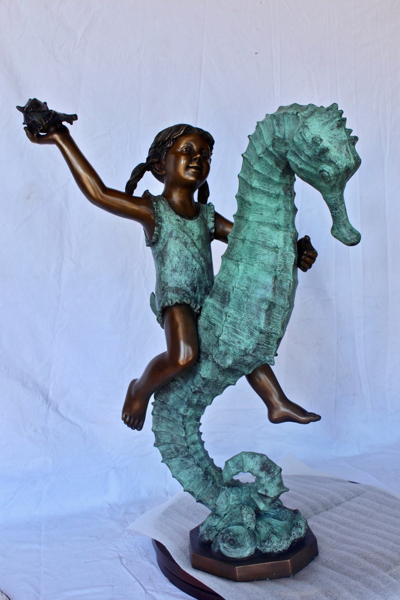 Boy and girl riding seahorses bronze fountain - Size: 18"L x 23"W x 38"H.