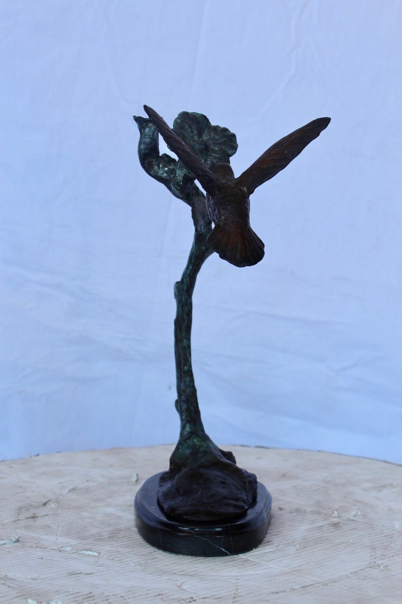 Hummingbird with flower bronze statue - Size: 12"L x 7"W x 15"H.