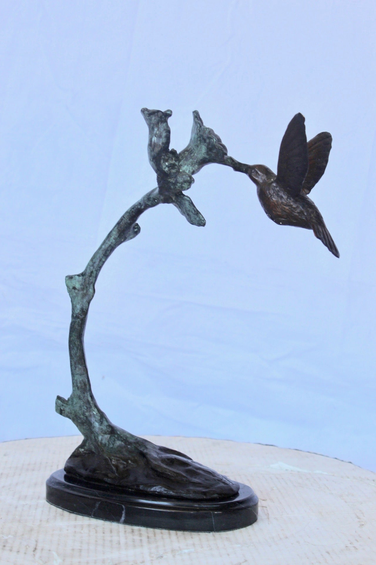 Hummingbird with flower bronze statue - Size: 12"L x 7"W x 15"H.