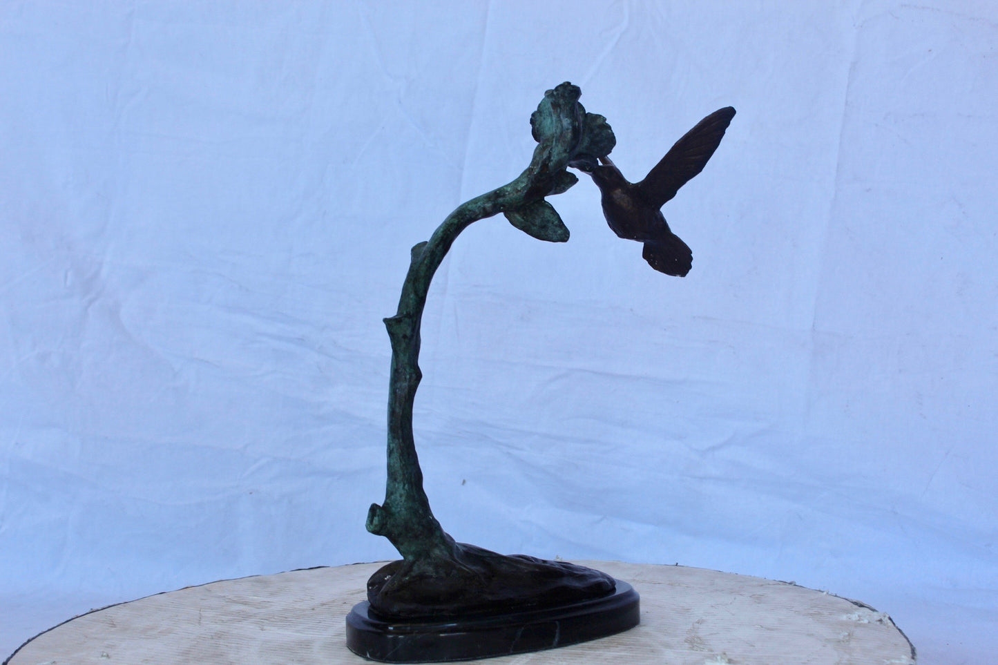 Hummingbird with flower bronze statue - Size: 12"L x 7"W x 15"H.