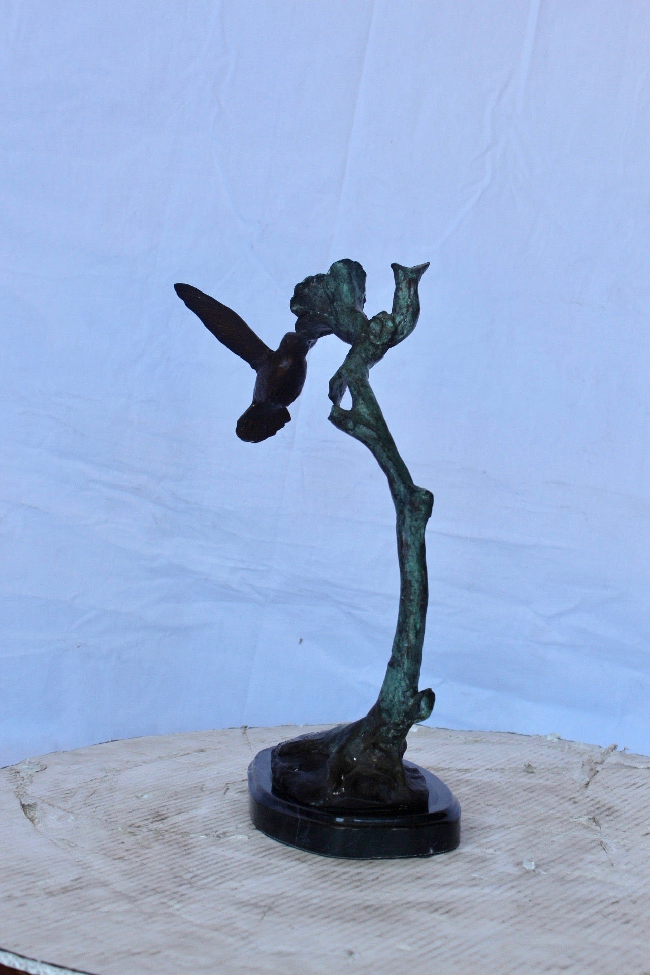 Hummingbird with flower bronze statue - Size: 12"L x 7"W x 15"H.