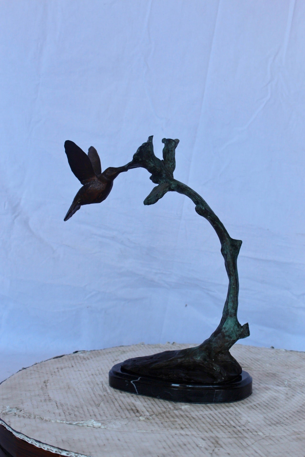 Hummingbird with flower bronze statue - Size: 12"L x 7"W x 15"H.