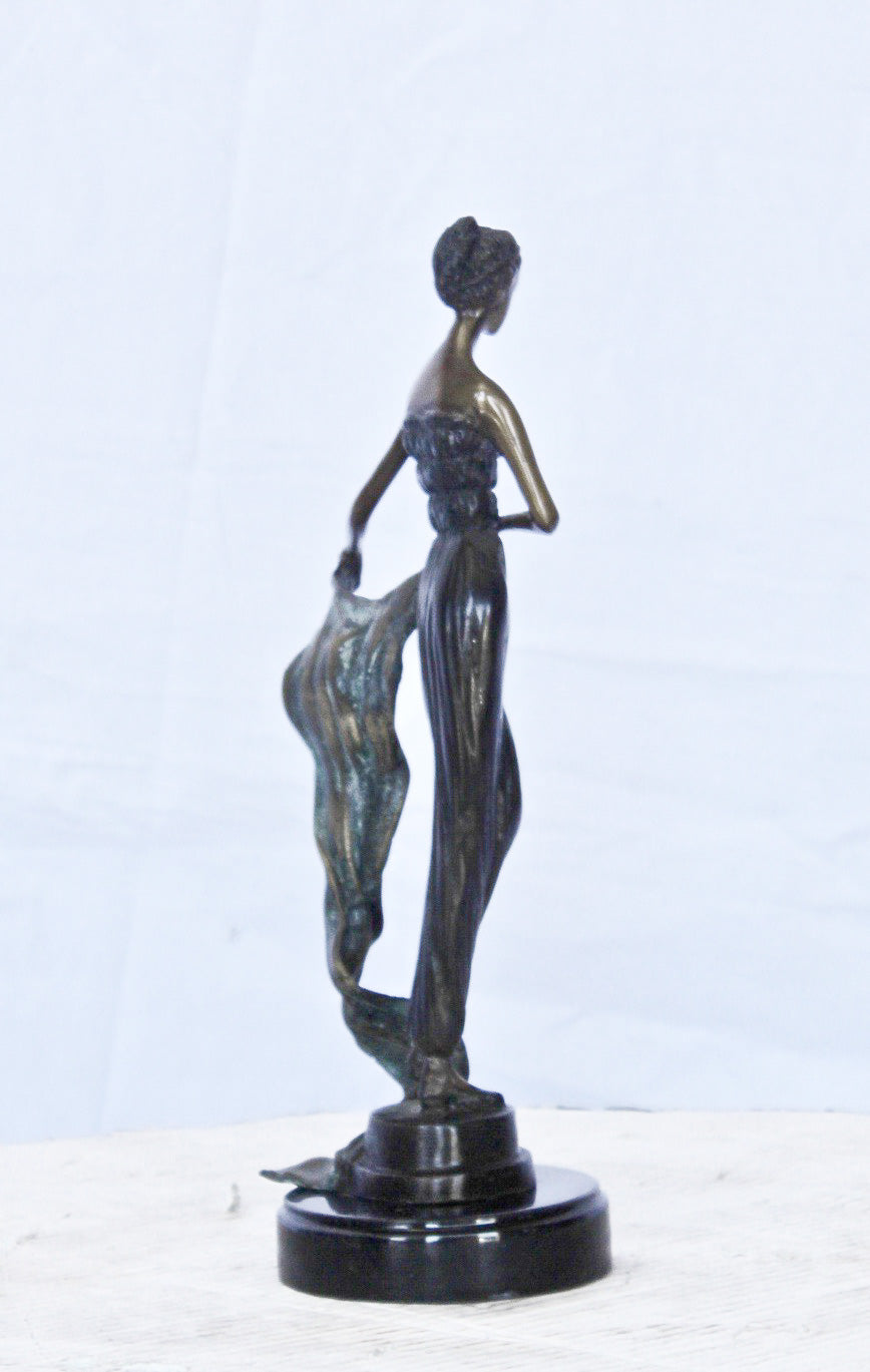 Young girl holding a sheer sheet in the wind - Size: 6"L x 4"W x 13"H.