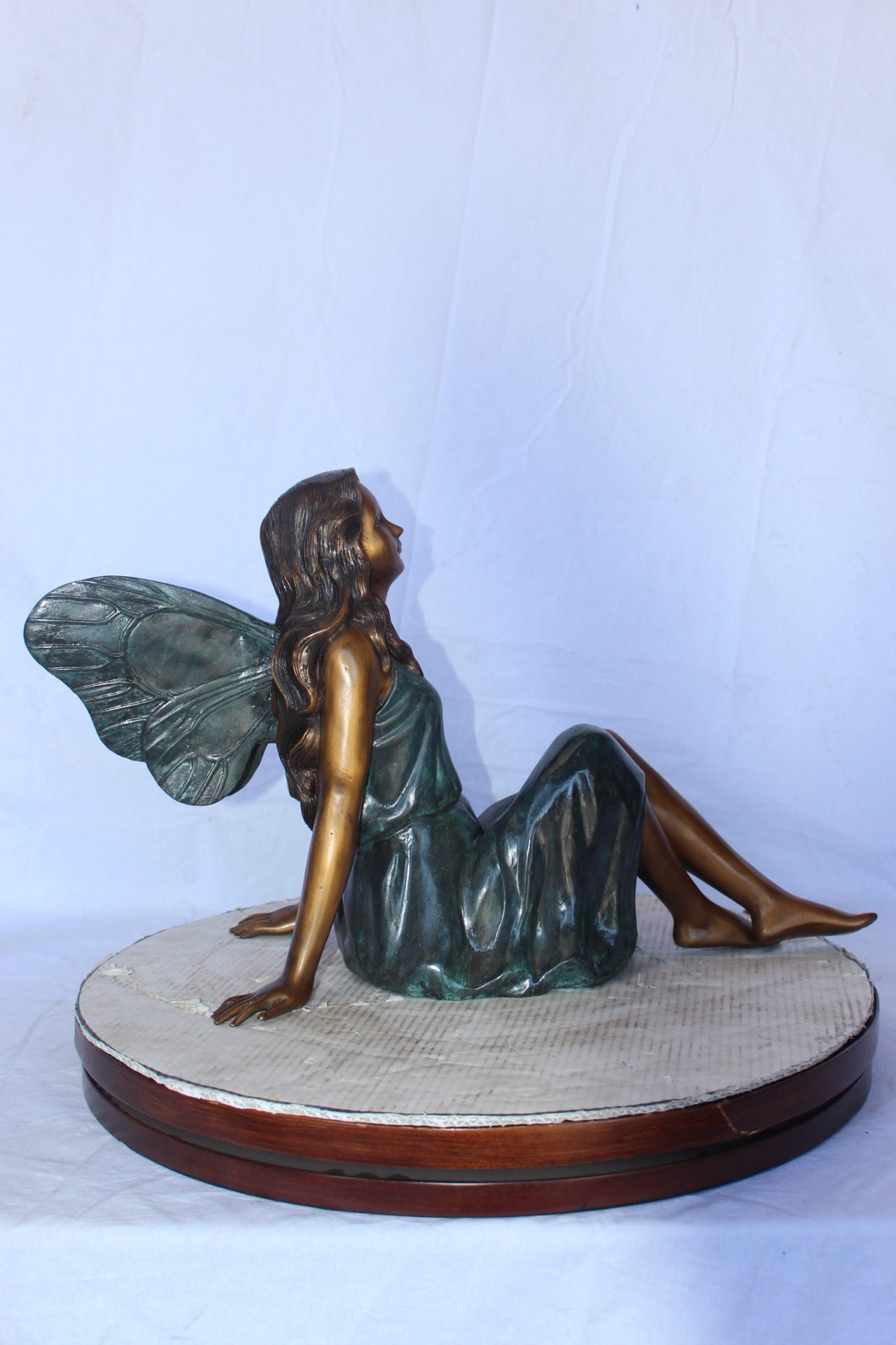 Fairy angel sitting peacefully bronze statue -  Size: 27"L x 12"W x 16"H.