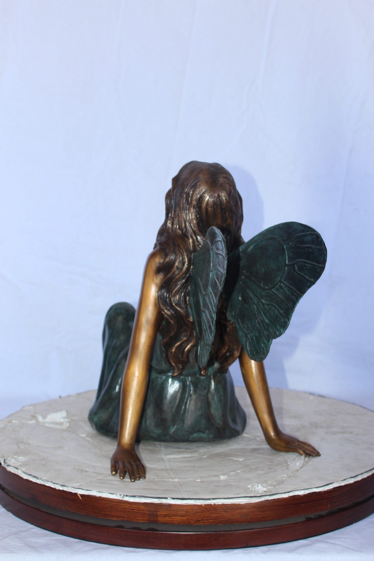 Fairy angel sitting peacefully bronze statue -  Size: 27"L x 12"W x 16"H.
