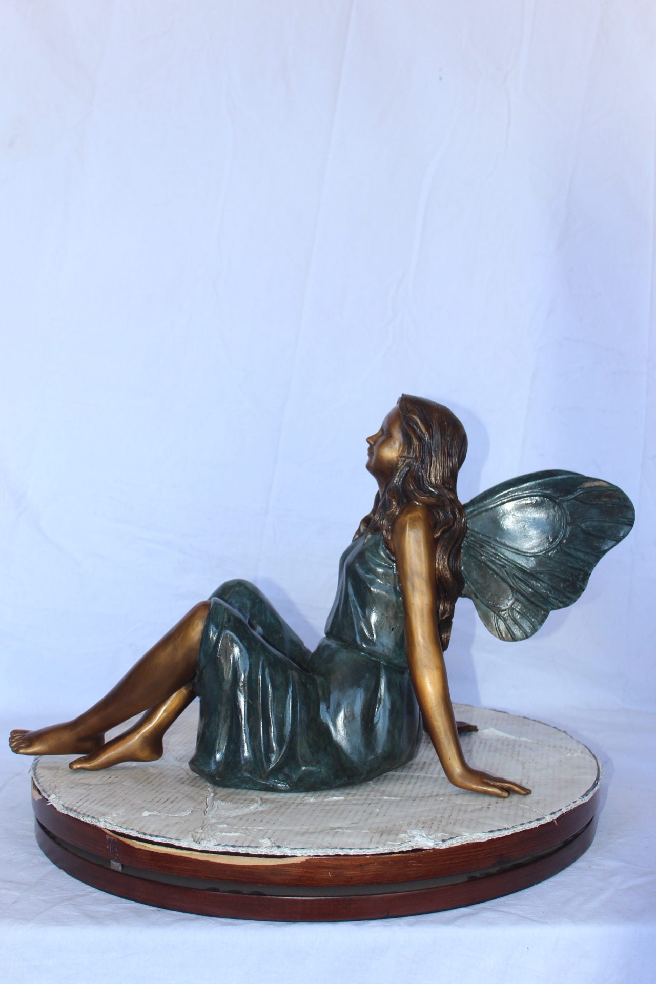 Fairy angel sitting peacefully bronze statue - Size: 27"L x 12"W x 16"H.
