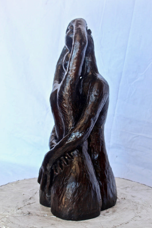 Lovers embracing one another bronze statue - Size: 13"L x 10"W x 24"H.