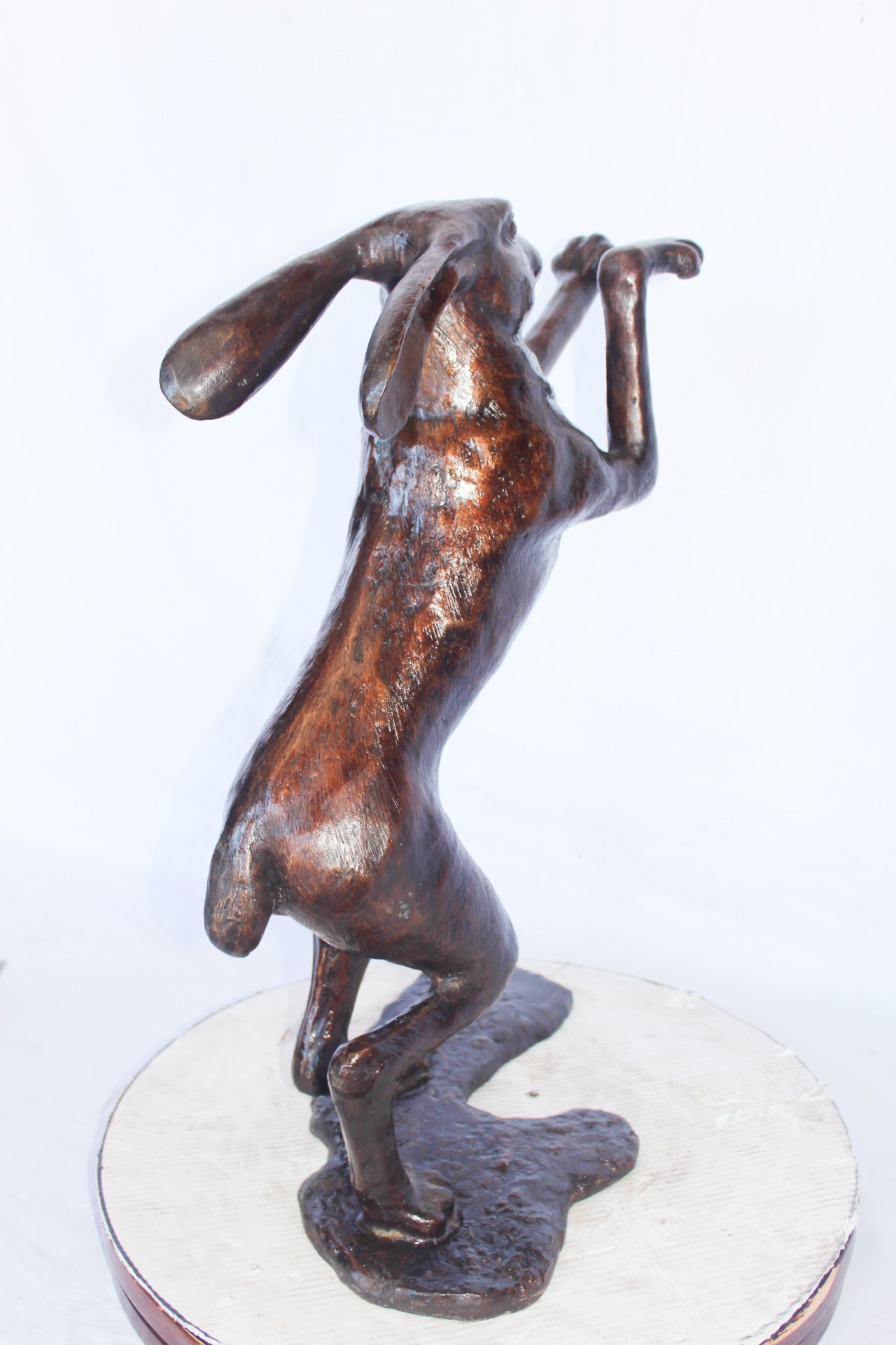 Leaping jackrabbit bronze statue - Size: 21"L x 13"W x 24"H.