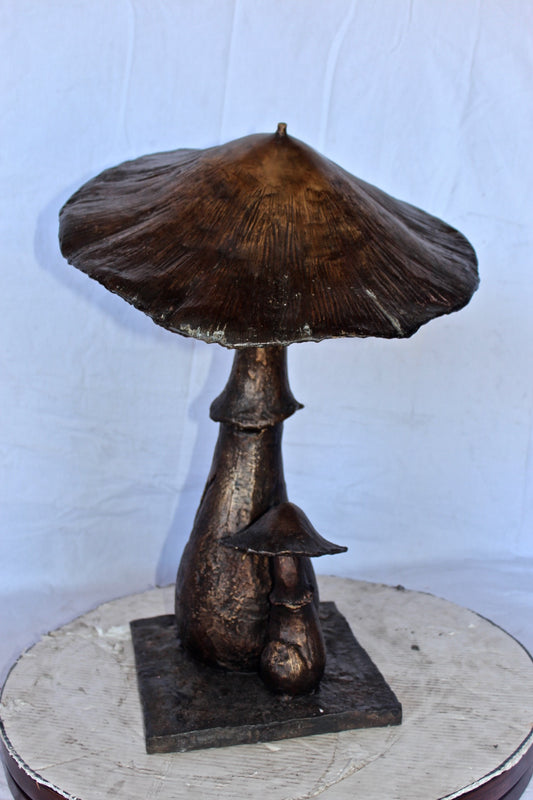 Leaning mushroom bronze statue fountain - Size: 18"L x 17"W x 24"H.