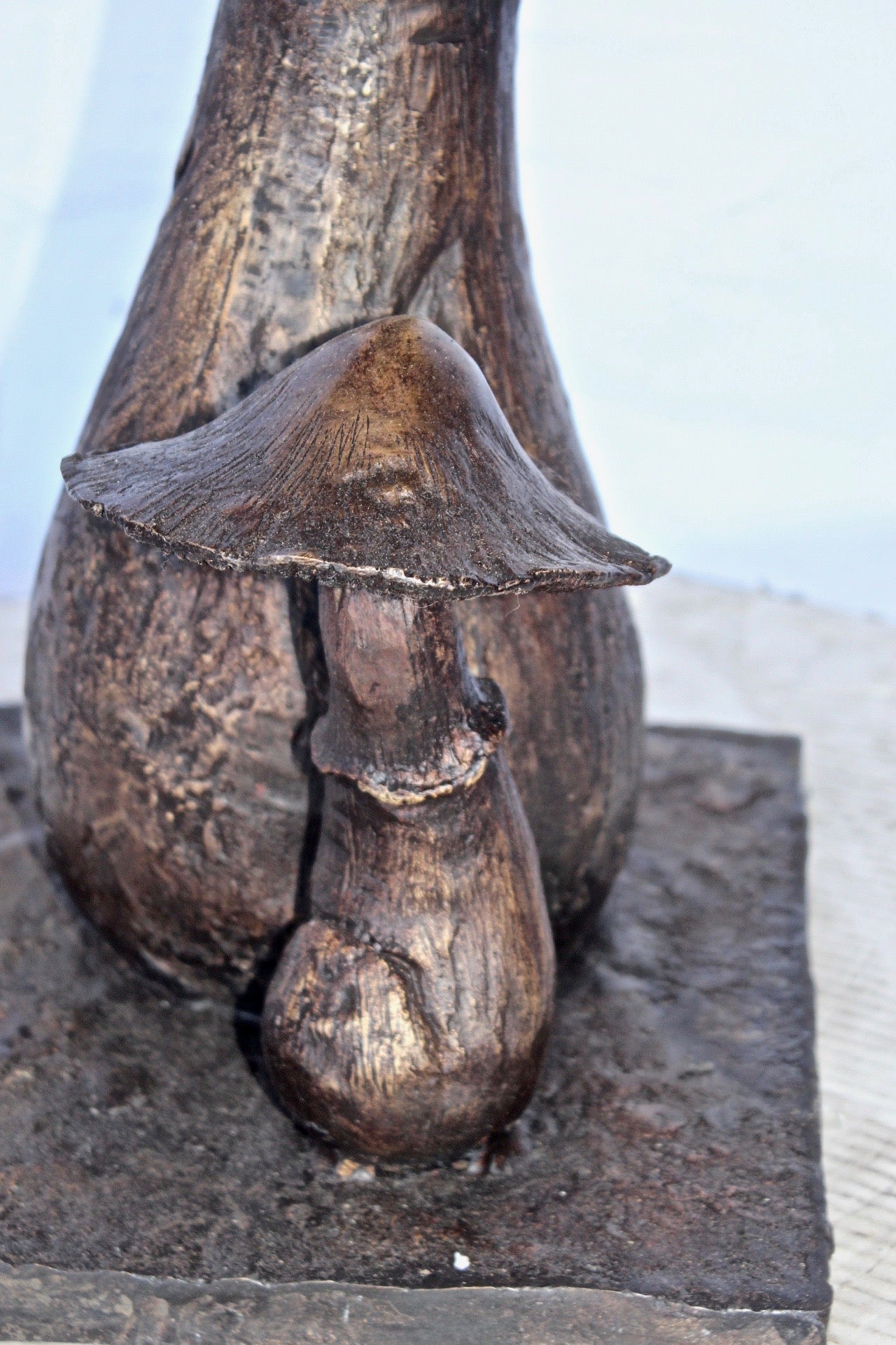 Leaning mushroom bronze statue fountain - Size: 18"L x 17"W x 24"H.