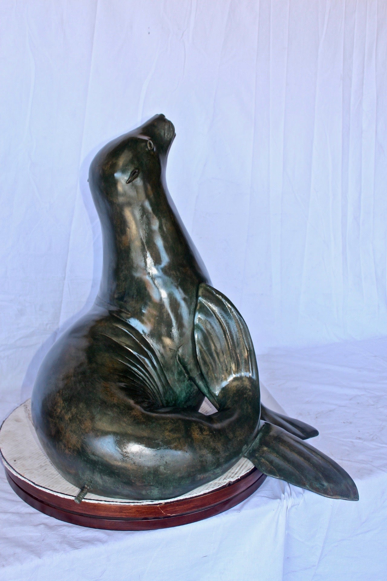 Perched seal bronze statue fountain green patina - Size: 35"L x 24"W x 27"H.