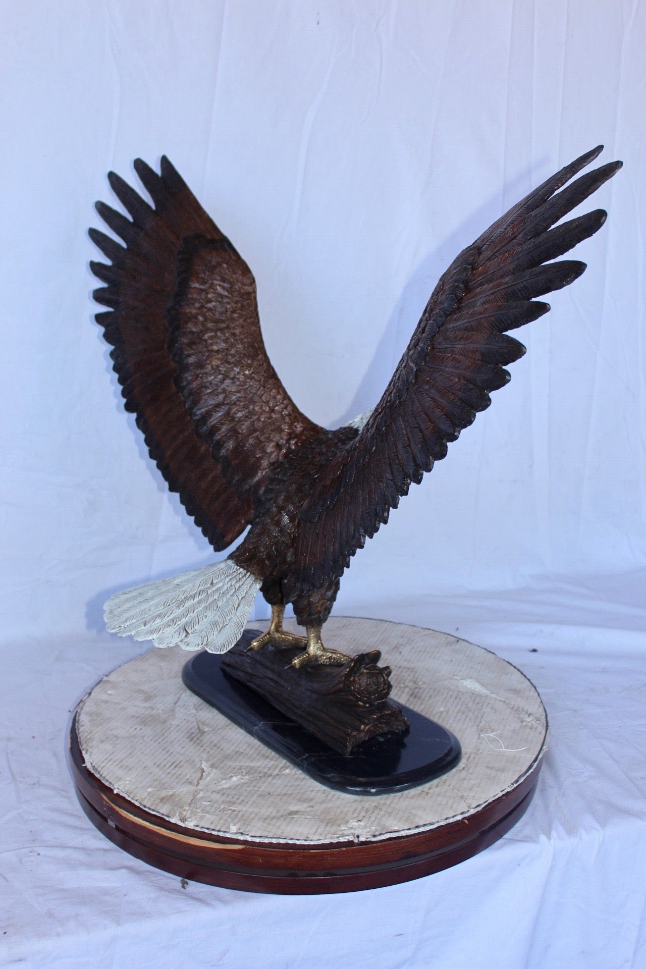 Perched eagle bronze statue - Size: 35"L x 21"W x 29"H.