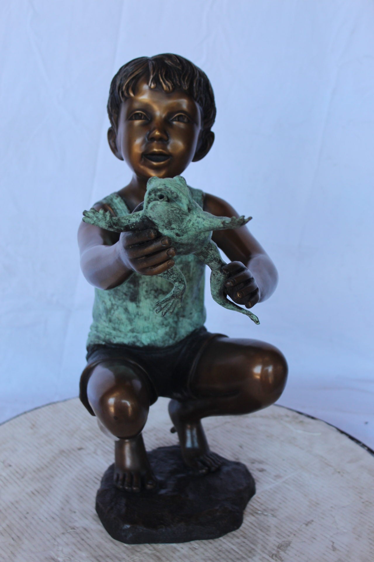 Young boy holding a frog bronze statue fountain - Size: 18"L x 10"W x 22"H.