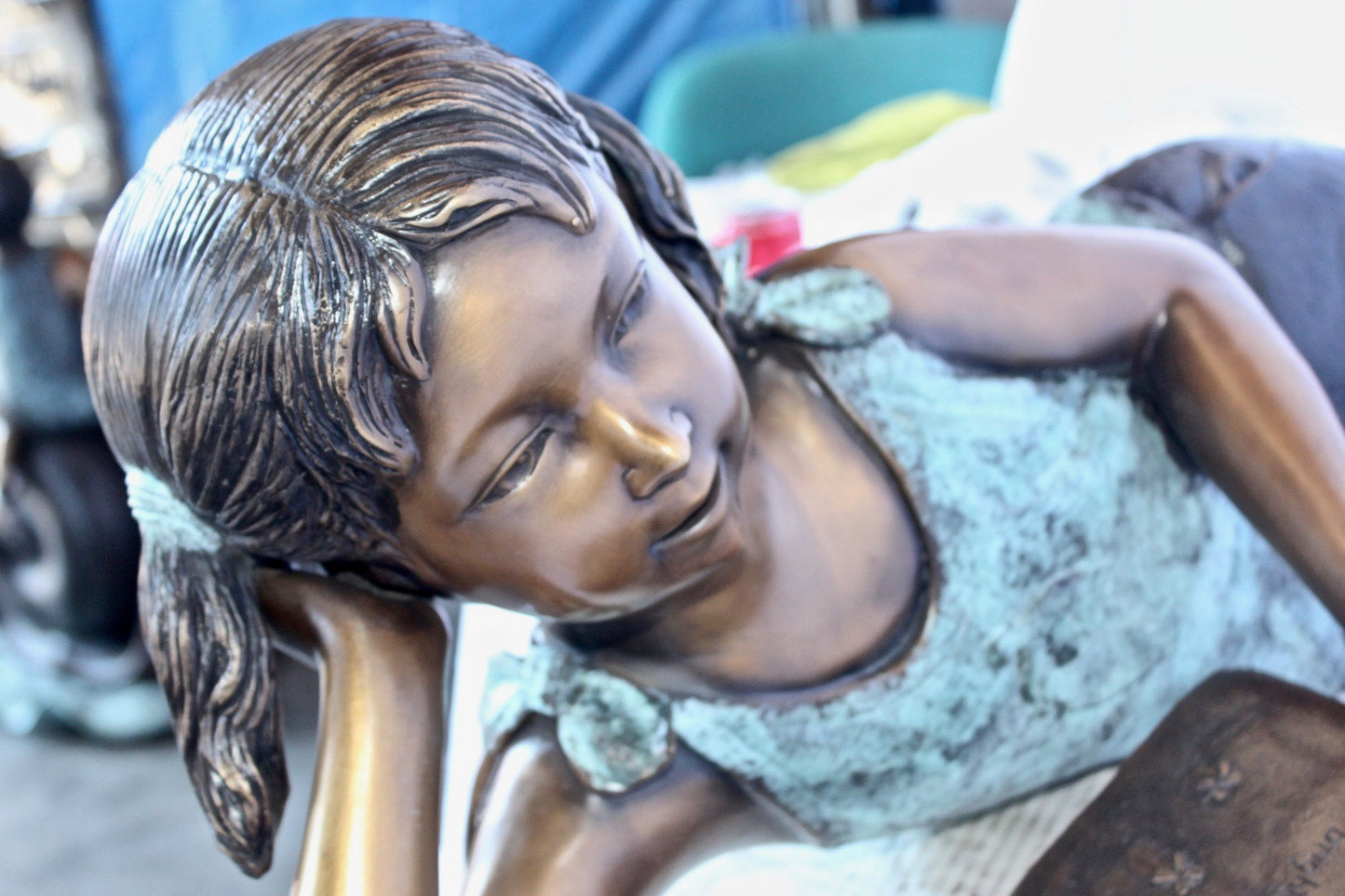 Nifao Bronze Girl Reading on Ground Statue – Hand-Cast Lost Wax Outdoor Sculpture with Book, Patina Finish - 40" L x 17" W x 13" H.
