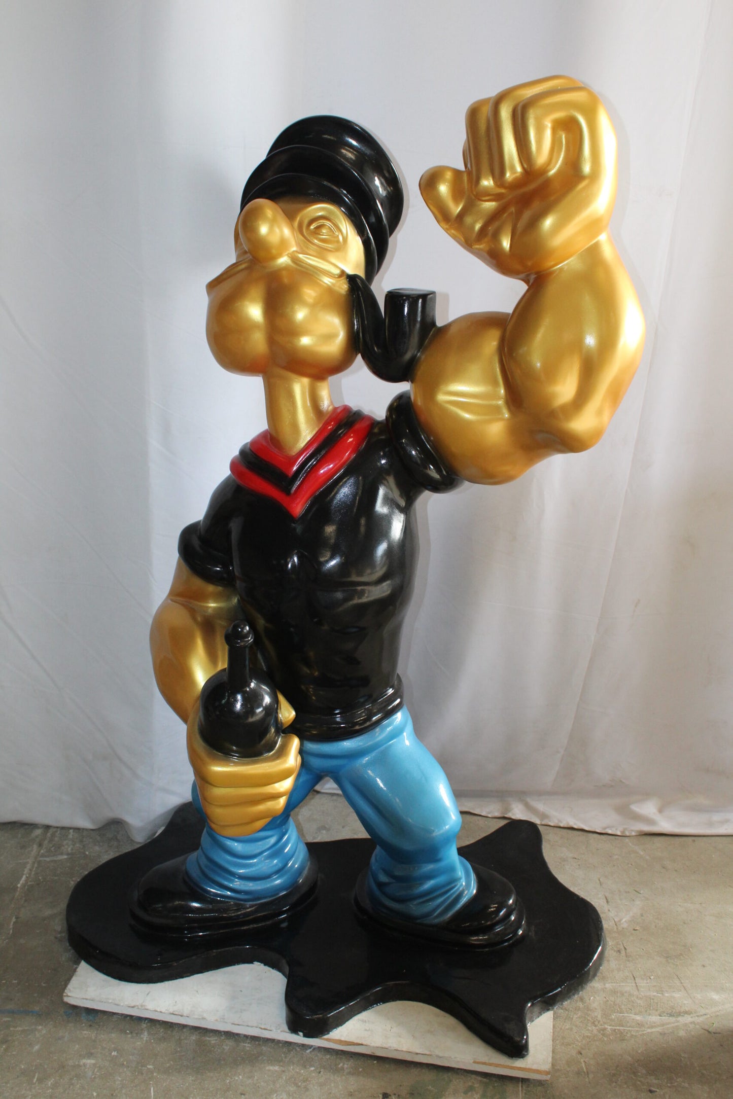 Fiberglass Poppey Statue, Iconic and Majestic in Black Shirt 40" x 24" x 60"H