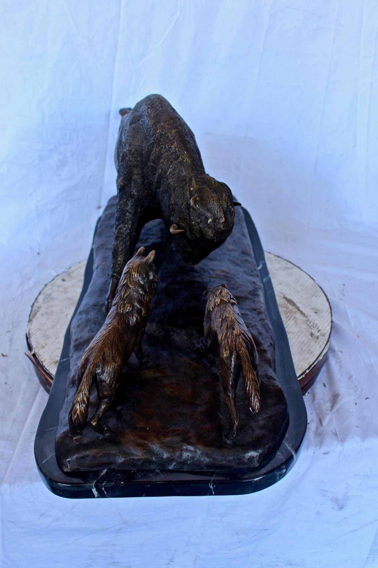 Charging bison v. Wolves bronze statue -  Size: 36"L x 17"W x 17"H.