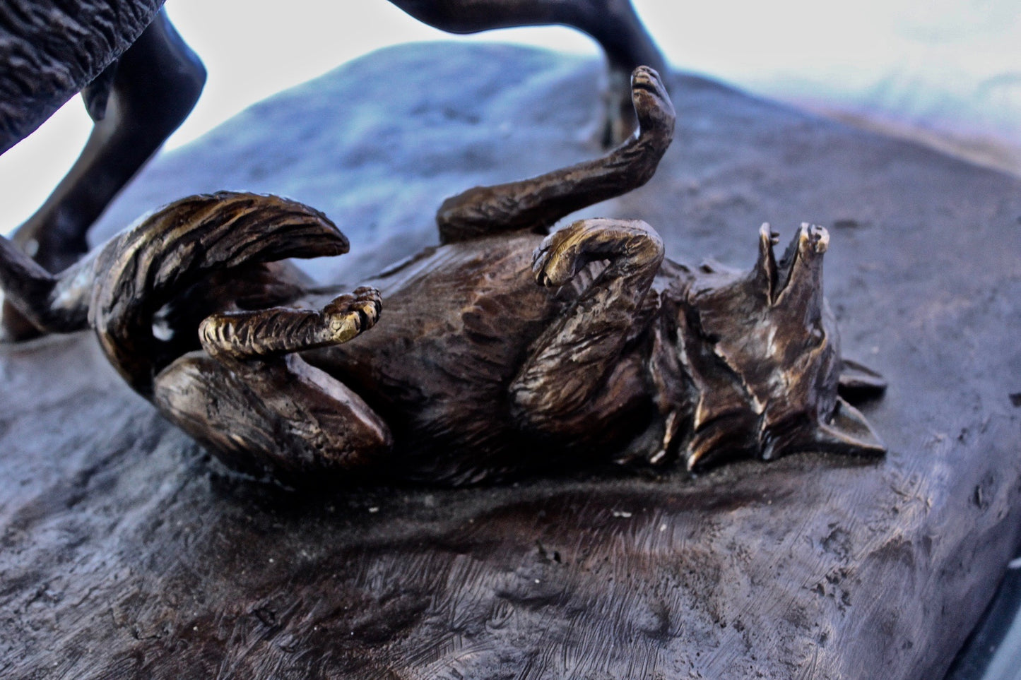 Charging bison v. Wolves bronze statue -  Size: 36"L x 17"W x 17"H.