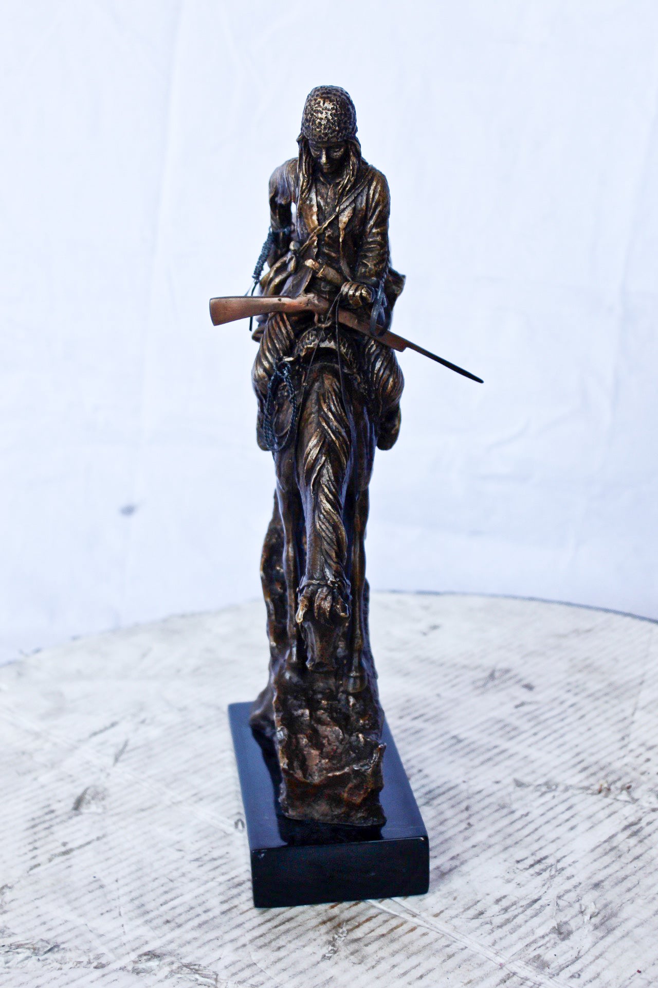 Remington replica Mountain Man bronze statue - Size: 10"L x 4"W x 15"H.