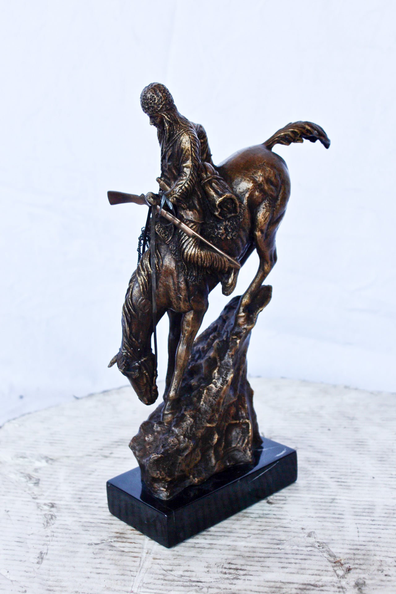 Remington replica Mountain Man bronze statue - Size: 10"L x 4"W x 15"H.