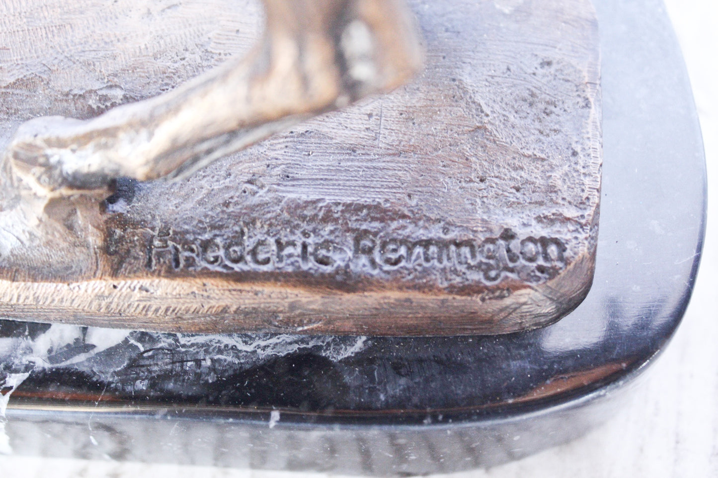Remington replica Cowboy bronze statue - Size: 5"L x 15"W x 13"H.